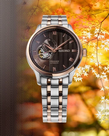 Relógio Seiko com caixa em aço inoxidável, mostrador castanho e movimento automático.